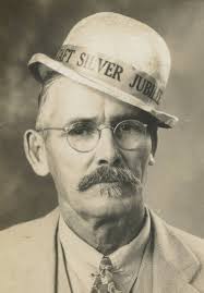 Men standing at Birceland Saloon railing 1875
