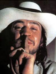 Does Fat Mike use an anchored pinky technique while playing guitar?