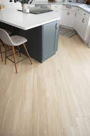 Our New Wood Look Tile Floors Brepurposed Wood Tile Floor Kitchen Wood Look Tile Tile Floor Living Room