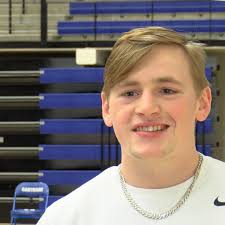 Three Carthage athletes sign to play football in college