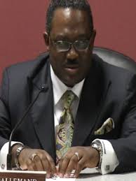 Former Bibb superintendent Dallemand testifies: '$100K was supposed to be  mine'