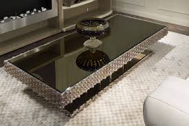 Set up an enchanting living room with stylish wood and glass coffee tables. Mirrored Dark Coffee Table