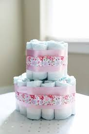 Of course, no baby shower would be complete without a decorative diaper cake, and no diaper cake would be complete without huggies® little snugglers diapers that help to keep your newborn's perfect skin clean and healthy. Diaper Cake Baby Shower Centerpieces Abby Lawson