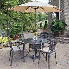 Home Styles Largo 5 Piece Patio Dining Set With Umbrella And Cushions 5561 3286c The Home Depot Patio Dining Set Outdoor Dining Set Patio