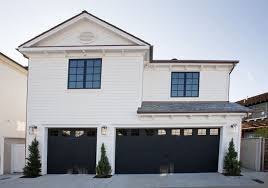 Black And White House With Wood Garage Door Pin By Cedar Miller On My Home Black Garage Doors Garage Doors House