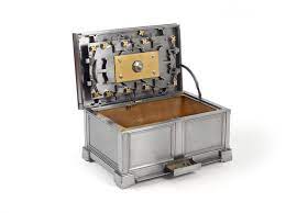 The nice 1960's gift box serves as a storage box. This Puzzle Box Forged Entirely From Metal Is Incredible Twistedsifter