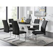 The round glass top of the table is supported by a sculptural silver base. Black Glass Dining Table Sets You Ll Love Wayfair Co Uk