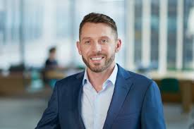 Structural steel beams, structural steel stairs, glazed balustrades, timber handrails, finishes to stair and timber handrails, timber flooring. Gordon Williams Profile Partner Sydney Minterellison