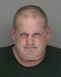 Man accused of burying father's remains in Port Orford trailer park,  stealing benefits