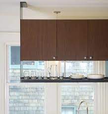 Accordingly, having an angled ceiling build a frame to support the skin and install it so that it looks like the continuation of the same cabinet. Hanging Shelf Storage Decoist Hanging Shelf Kitchen Hanging Kitchen Shelves Hanging Pots Kitchen