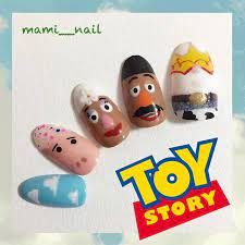 mami on instagram toy story ネイル 前回に引き続き トイ ストーリーの賑やかネイル 今回は左手 o o ジェシー ミスター ポテトヘッド ミセス ポテトヘッド ハム 子供部屋 壁紙の ネイル マニキュア 赤 キャンドゥ