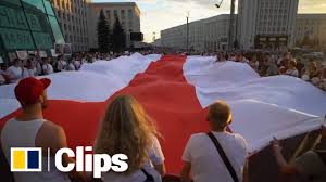Opposition supporters light phones and wave an old belarusian national flag during a protest rally in front of the government building at independent square in minsk, belarus, aug. Could Red And White Belarus Protest Flag Provoke A Russian Intervention South China Morning Post