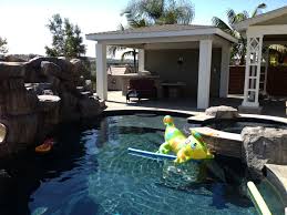 Tell us about backyard getaway: Exotic Backyard Getaways Custom Swimming Pools Spas