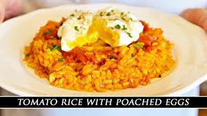 It's a restaurant style recipe at home! A Seriously Good Rice Dish Spanish Tomato Rice With Poached Eggs Youtube