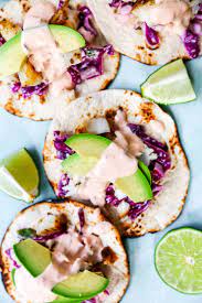 In a mixing bowl add the salmon, egg, scallions, almond flour and bang bang sauce. Fish Tacos With Limey Slaw Bang Bang Sauce