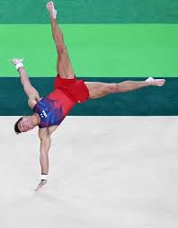 Gymnastics Floor Exercise In 2020 Male Gymnast Popular Workouts Gymnastics