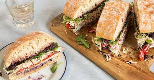 Roast Chicken Pan Bagnat With Olive Tapenade And Goat Cheese Soup And Sandwich Pan Bagnat Best Sandwich Recipes