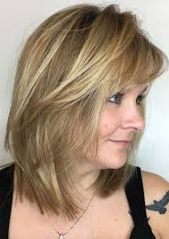 Couple bold long side swept bangs with sterling silver hair color. Medium To Long Hairstyles For Women Over 40 Unique Top 51 Haircuts Hairstyles For Women Over 50 Glowsly Stock