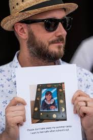 Protesters rally for immigrant rights at Jacksonville City Hall