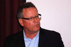 Political expert David Mullinax speaks to Rotary