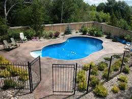 Traditional backyard pools can occupy a sizable chunk of your real estate. Put In An Inground Swimming Pool And Beautiful Backyard This Make Take Longer Than Landscaping Around Pool Inground Pool Landscaping Swimming Pools Backyard