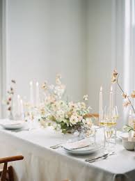 Vases stagger in height and size to create dramatic high/low contrast. Contemporary Scandi Wedding Inspiration Modern Wedding Decor Wedding Table Settings Wedding Table