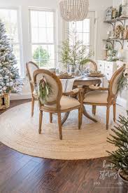 Simple Farmhouse Christmas Table Tips On Creating An Adorable And Affordable Christmas Ta Round Table Decor Farmhouse Christmas Kitchen Family Room Decorating