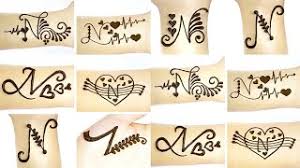 Related post mehndi design alphabet all mehndi design 19;nov 12, explore rashmi seth mehndi's board alphabet tattoo designs on see more . Best Of N Name Mehndi Design Free Watch Download Todaypk