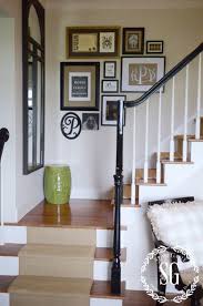 I can see the edge of something framed (look at how low it is hung) and at the top of the stairs is a large piece of art. Top 10 Gallery Wall Ideas That Will Transform Your Home Stair Decor Art Gallery Wall Gallery Wall