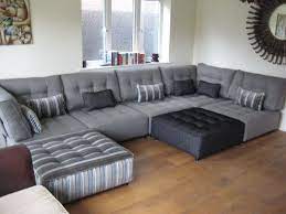 Dense foam padding and a pocket coil spring system provide a luxurious seating experience. Such A Clever Use Of Neutrals On This Enormous Sectional Sofa Set Furniture Game Room Furniture Room Sofa