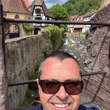 I need some help, if anyone knows. I am looking for a free (preferably  obviously) e-mail service that uses port 25 for SMTP. Number of e-mails per  day will be 3-4, so