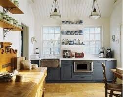 Charcoal Grey Base Cabinets White Upper Cabinets Whitewashed Pine Ceiling Natural Hardwood Floo House Beautiful Magazine Kitchen Grey Kitchen Kitchen Design