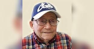 George E. Mills Obituary