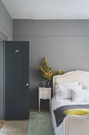 From throw pillows and blankets to statement rugs refined living room in grey shades looks bolder with yellow chairs and a painting. 26 Grey Bedroom Ideas Grey Bedroom