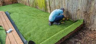 The existing landscape is bumpy and rough with rocks i chose to just lay the artificial grass directly over them. How To Lay An Artificial Lawn A Visual Guide To Diy