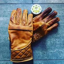 Black And Gold Motorcycle Gloves Waxed Goldtop Flat Tracker Gloves Using Ducks Wax Water Repellent Balm To Give Antique Patina And Burnt Gold Leather Motorcycle Gloves Motorcycle Gloves Gloves