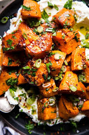 Oven Roasted Sweet Potatoes Recipe With Honey And The Modern Proper Recipe Oven Roasted Sweet Potatoes Sweet Potato Recipes Roasted Roasted Sweet Potatoes