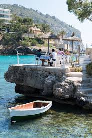 Illeta Is A Restaurant On A Little Island Just Off The Coast Of The Family Friendly Beach Of Camp De Mar Places To Travel Spain Travel Travel Around The World