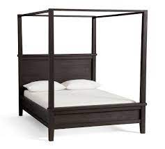 It's built with standard lumber, which makes it incredibly sturdy. Farmhouse Canopy Bed Wooden Beds Pottery Barn