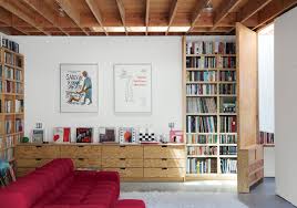 There is even storage space for the lawn mower, bikes, gardening tools and more. Photo 8 Of 10 In Garage Living Room Photos From 30 Modern Homes With Libraries Dwell