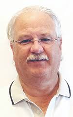 LOCAL FIRM BUYS FORD DEALERSHIP