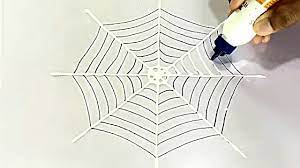 First you want to start with a basic frame of one vertical length of yarn and one horizontal. How To Make A Simple Spider Web At Home Youtube
