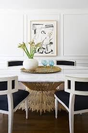 Gorgeous Dining Room Boasts An Oval Brass And Marble Dining Table Lined With White And Black French Dining Dining Table Marble Marble Dining Oval Table Dining