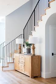 Modern Farmhouse Foyer Features A Custom Staircase With Wrought Iron Stair Railing Home Bunch F Modern Staircase Wrought Iron Stair Railing Staircase Design