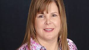 Principal works with others for others — students