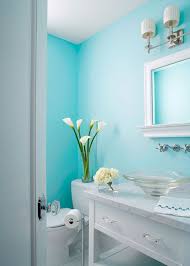 Delightful Aqua Powder Room With Walls Of Aqua Blue As Backdrop For Nickel Double Sconces And White Bathroom Colors Blue Tiffany Blue Bathrooms Bathroom Colors
