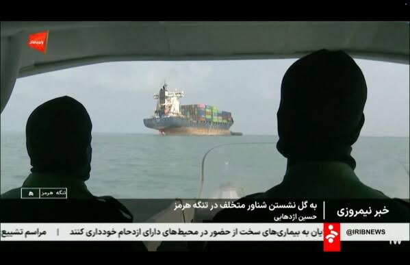 Iran claims a foreign ship got stuck in the Strait of Hormuz but the vessel is tied to Tehran | AP News