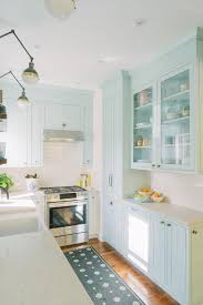 I'll open the top drawer next to the stove and there will be the oven mitts. Cabinets Over Stove Design Ideas