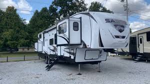 A coupling between a trailer and a vehicle used for towing. Front Living Bunkhouse Loft 2021 377fll Sabre 5th Youtube