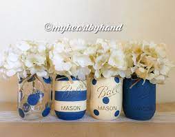 Nautical Baby Shower Centerpiece Navy Blue And Cream White Distressed Mason Jar Centerpieces P Baby Shower Centerpieces Nautical Baby Shower Baby Shower Diy